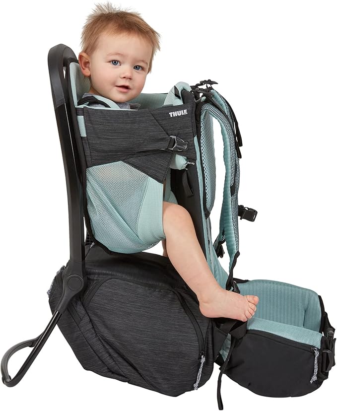 Thule Sapling Child Carrier Backpack - Machine Washable Seat - Self-Standing Frame - Adjustable padded straps for parents - Ergonomic seat with under-leg support for child - UPF 50 Sunshade